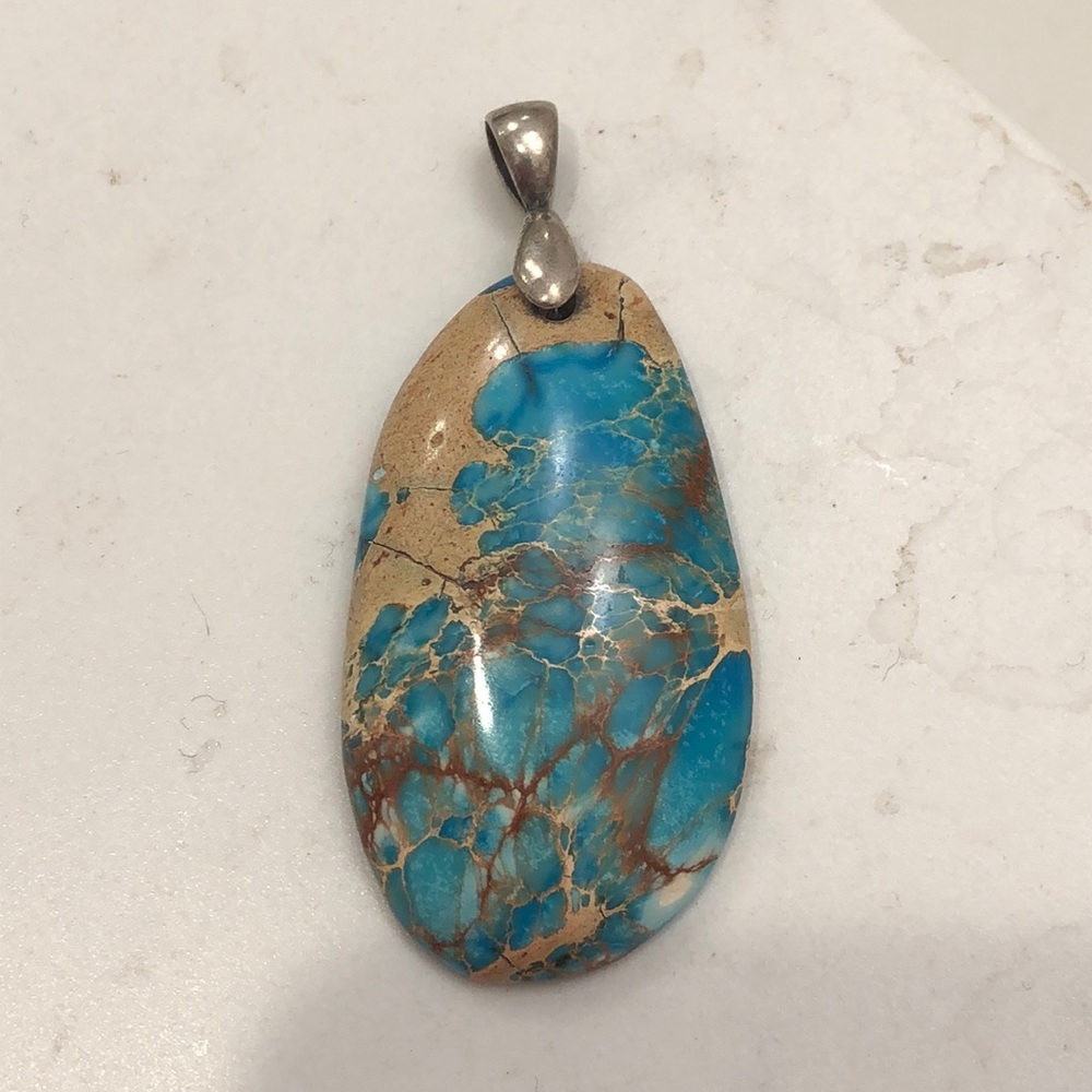 Turquoise pendant. Chain not included.